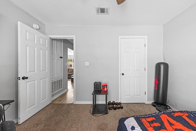 5123 Whitehurst Ln, Crestview, FL 32536 - bedroom featuring carpet floors and a textured ceiling