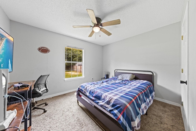 5123 Whitehurst Ln, Crestview, FL 32536 - carpeted bedroom with an office area, ceiling fan, and a textured ceiling
