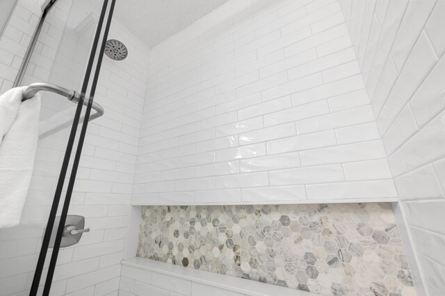 2606 Scenic Gulf Dr Unit 2412, Miramar Beach, FL 32550 - bathroom view of tiled shower