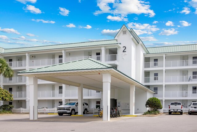 2606 Scenic Gulf Dr Unit 2412, Miramar Beach, FL 32550 - view of building exterior with covered parking