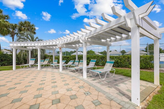 2606 Scenic Gulf Dr Unit 2412, Miramar Beach, FL 32550 - view of patio featuring a pergola