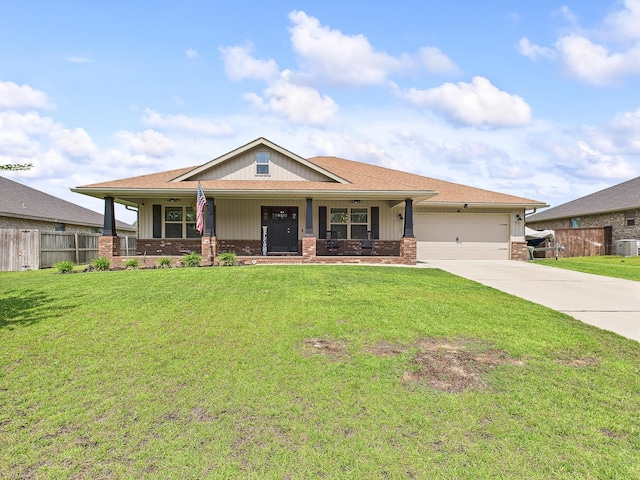 5740 Marigold Loop, Crestview, FL 32539 - view of front of property with concrete driveway, brick siding, a garage, and covered porch