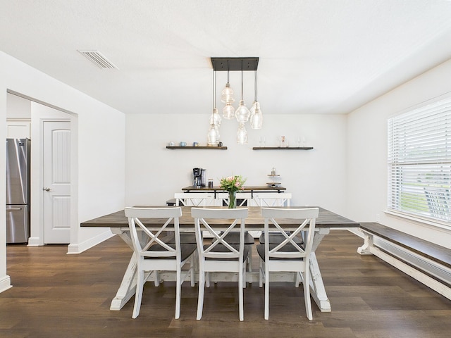 5740 Marigold Loop, Crestview, FL 32539 - dining area featuring wood finished floors and baseboards