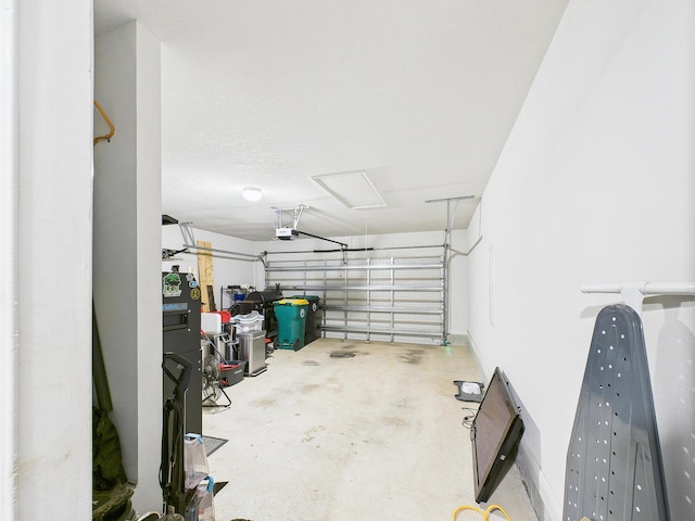 5740 Marigold Loop, Crestview, FL 32539 - garage featuring a garage door opener