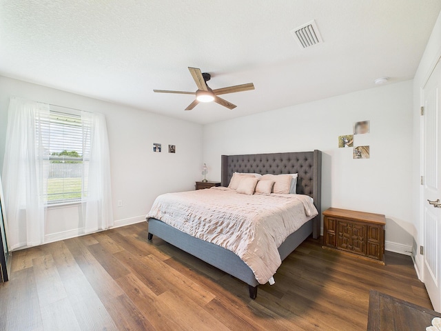 5740 Marigold Loop, Crestview, FL 32539 - bedroom with wood finished floors, baseboards, and a ceiling fan