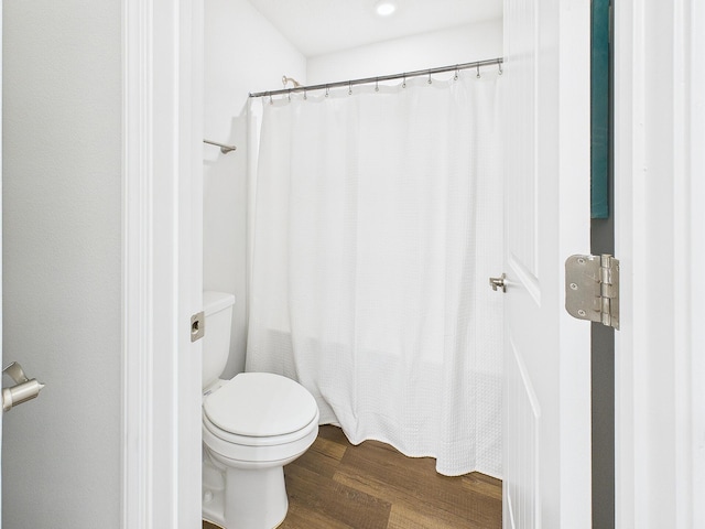 5740 Marigold Loop, Crestview, FL 32539 - bathroom with toilet, wood finished floors, and a shower with curtain