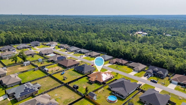 5740 Marigold Loop, Crestview, FL 32539 - aerial view of residential area featuring a forest