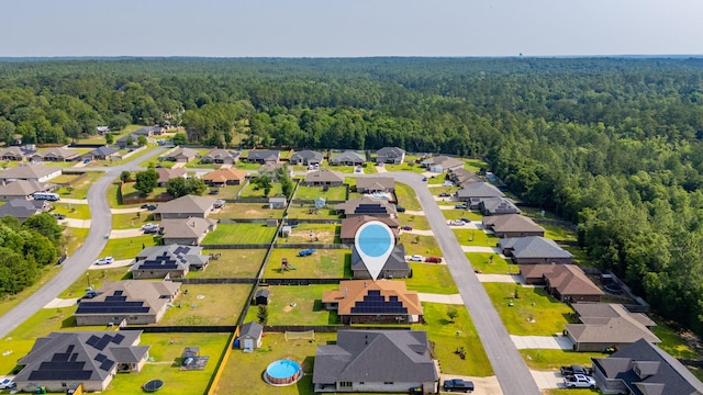 5740 Marigold Loop, Crestview, FL 32539 - aerial perspective of suburban area with a forest