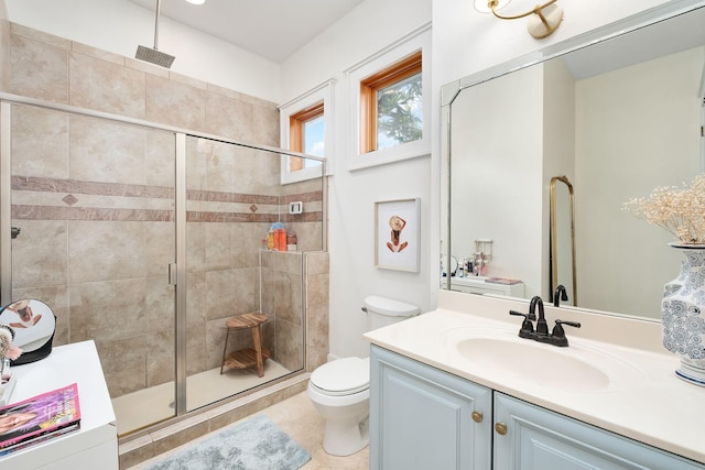 92 Carolyn Ln, Santa Rosa Beach, FL 32459 - bathroom with vanity, a shower stall, toilet, and tile patterned flooring