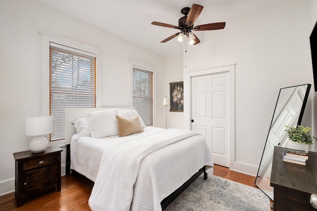 92 Carolyn Ln, Santa Rosa Beach, FL 32459 - bedroom with wood finished floors, baseboards, and ceiling fan