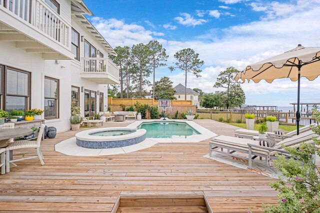 92 Carolyn Ln, Santa Rosa Beach, FL 32459 - view of swimming pool with a fenced backyard, a deck, and an in-ground hot tub