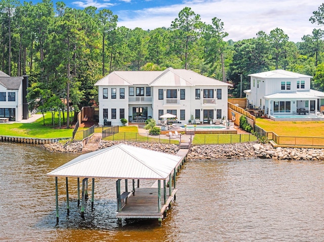92 Carolyn Ln, Santa Rosa Beach, FL 32459 - dock with a water view, an outdoor pool, a patio, a balcony, and boat lift