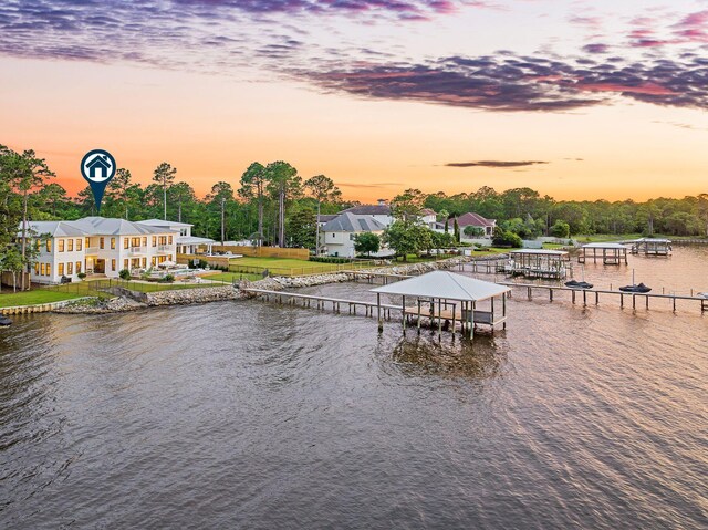 92 Carolyn Ln, Santa Rosa Beach, FL 32459 - dock area with a water view, a lawn, and view of wooded area