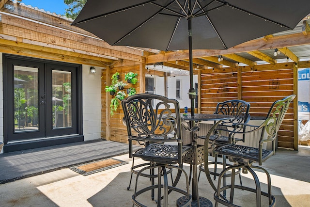 29 SE Alexandra Pl, Fort Walton Beach, FL 32548 - view of patio with french doors and outdoor dining area
