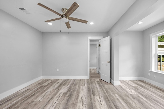 14351 State Highway 20, Niceville, FL 32578 - unfurnished bedroom with wood finished floors, recessed lighting, and ceiling fan