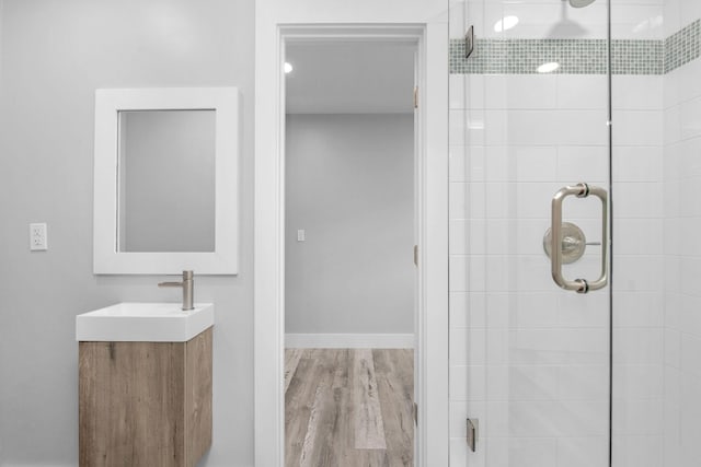 14351 State Highway 20, Niceville, FL 32578 - full bath featuring a shower stall, vanity, and wood finished floors