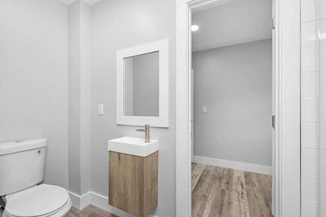 14351 State Highway 20, Niceville, FL 32578 - bathroom featuring vanity and wood finished floors