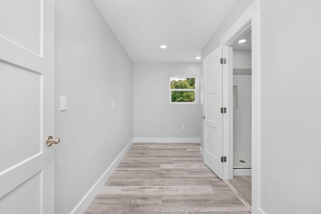 14351 State Highway 20, Niceville, FL 32578 - hallway with recessed lighting and light wood-style flooring