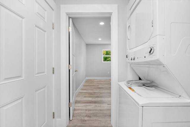 14351 State Highway 20, Niceville, FL 32578 - laundry area with stacked washer / dryer, recessed lighting, and light wood-type flooring