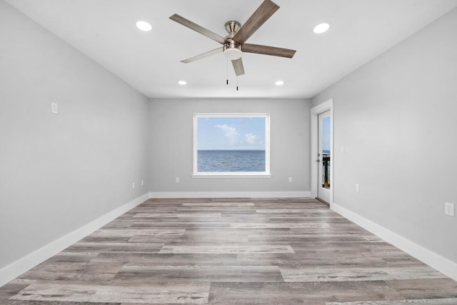 14351 State Highway 20, Niceville, FL 32578 - empty room with ceiling fan, recessed lighting, and wood finished floors