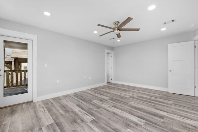 14351 State Highway 20, Niceville, FL 32578 - empty room featuring a ceiling fan, wood finished floors, and recessed lighting