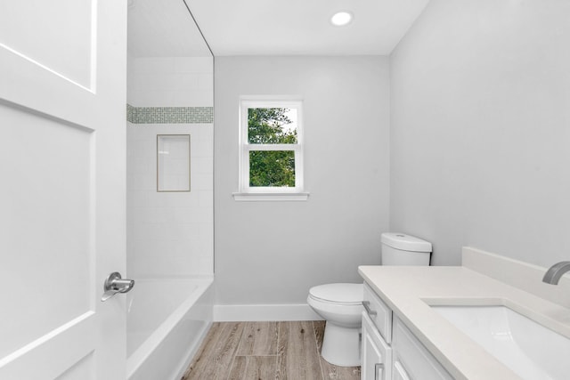 14351 State Highway 20, Niceville, FL 32578 - bathroom with wood finished floors, vanity, and bathing tub / shower combination