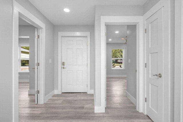 14351 State Highway 20, Niceville, FL 32578 - hallway featuring recessed lighting and wood finished floors