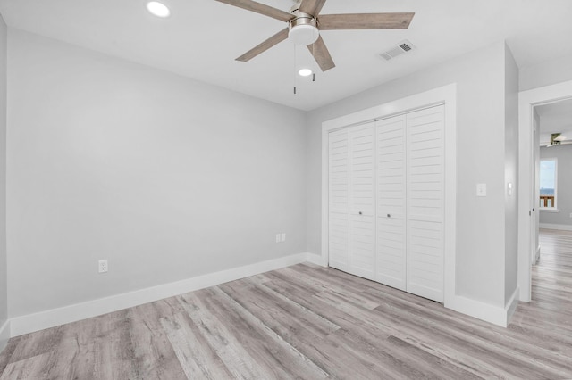 14351 State Highway 20, Niceville, FL 32578 - unfurnished bedroom featuring light wood finished floors, recessed lighting, a closet, and a ceiling fan