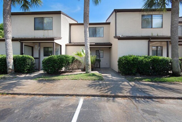 17620 Front Beach Rd Unit J2, Panama City Beach, FL 32413 - multi unit property with stucco siding and uncovered parking