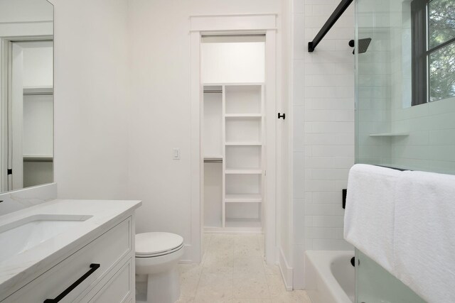 7570 E County Highway 30a, Watersound, FL 32461 - bathroom featuring vanity, toilet, a walk in closet, and shower / bathtub combination