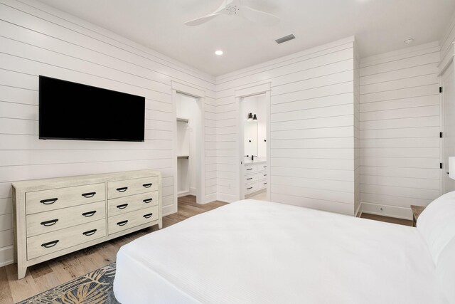 7570 E County Highway 30a, Watersound, FL 32461 - bedroom with light wood-style flooring, recessed lighting, and a ceiling fan