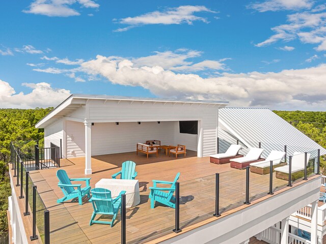 7570 E County Highway 30a, Watersound, FL 32461 - wooden terrace featuring an outdoor hangout area and outdoor dining space