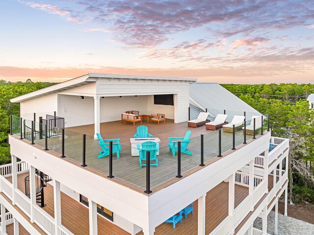 7570 E County Highway 30a, Watersound, FL 32461 - view of deck at dusk