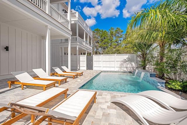 7570 E County Highway 30a, Watersound, FL 32461 - view of swimming pool with a patio and a fenced backyard