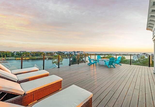 7570 E County Highway 30a, Watersound, FL 32461 - wooden deck with a water view