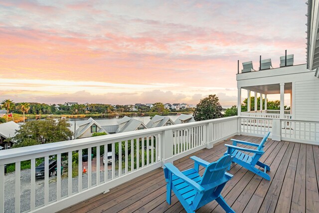 7570 E County Highway 30a, Watersound, FL 32461 - view of deck at dusk