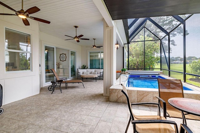 359 Indigo Loop, Miramar Beach, FL 32550 - outdoor pool featuring a patio area, a hot tub, outdoor lounge area, ceiling fan, and glass enclosure