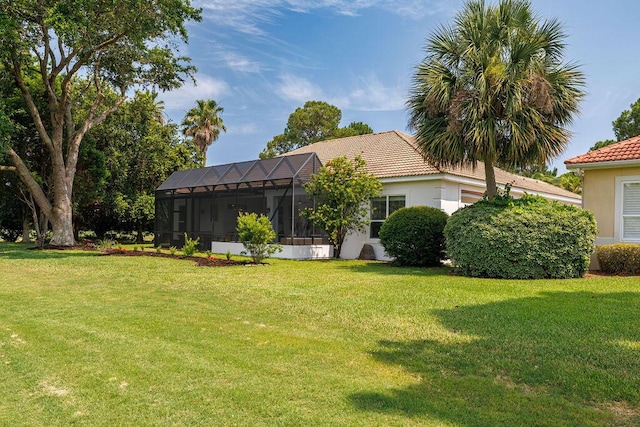 359 Indigo Loop, Miramar Beach, FL 32550 - view of green lawn with a lanai