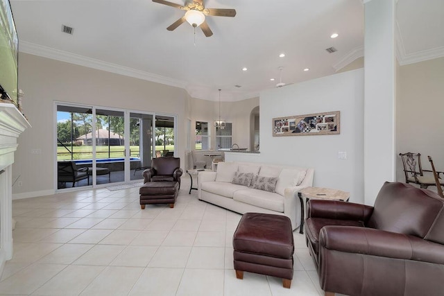 359 Indigo Loop, Miramar Beach, FL 32550 - living room with a ceiling fan, ornamental molding, arched walkways, light tile patterned floors, and recessed lighting