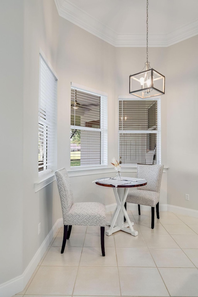 359 Indigo Loop, Miramar Beach, FL 32550 - dining area featuring a chandelier, crown molding, baseboards, tile patterned floors, and breakfast area