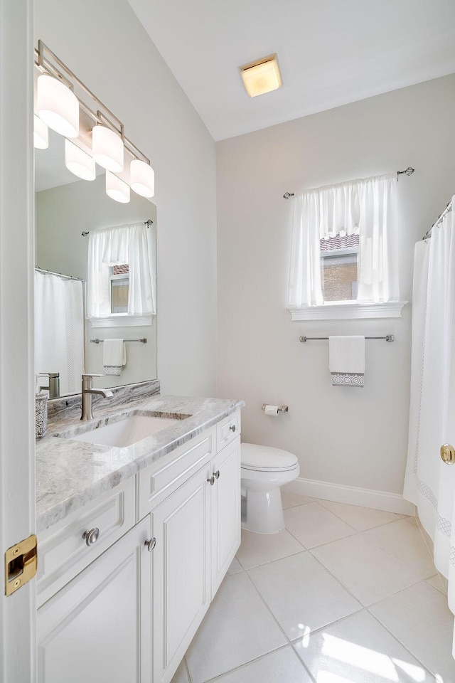 359 Indigo Loop, Miramar Beach, FL 32550 - bathroom with vanity, toilet, tile patterned floors, baseboards, and curtained shower
