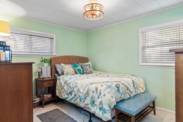 40 Flounder St, Santa Rosa Beach, FL 32459 - tiled bedroom featuring ornamental molding