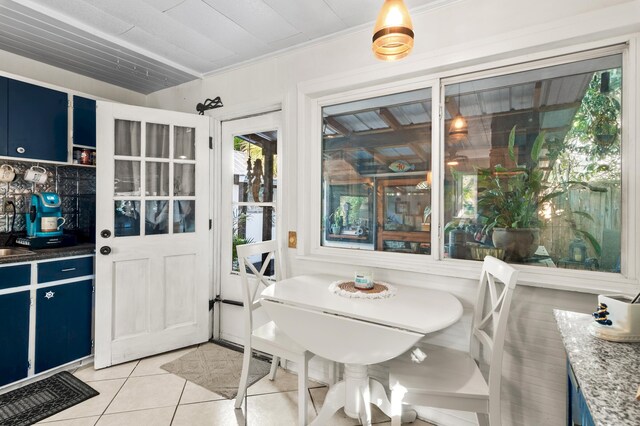 40 Flounder St, Santa Rosa Beach, FL 32459 - dining space with light tile patterned flooring