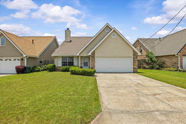 1176 Lost Trl, Fort Walton Beach, FL 32547 - traditional-style house with a front lawn, concrete driveway, brick siding, and a chimney