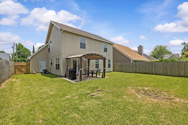 1176 Lost Trl, Fort Walton Beach, FL 32547 - rear view of house with central air condition unit, a patio, and a gate
