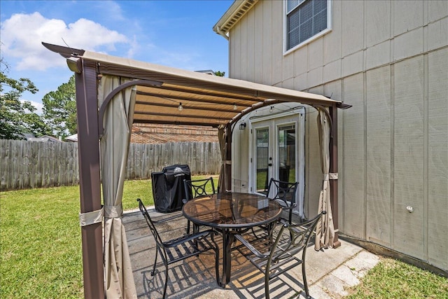 1176 Lost Trl, Fort Walton Beach, FL 32547 - view of patio featuring french doors and outdoor dining space