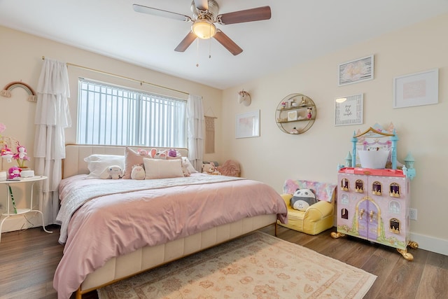 409 Hideaway Ln, Niceville, FL 32578 - bedroom with wood finished floors and ceiling fan