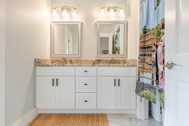 409 Hideaway Ln, Niceville, FL 32578 - bathroom with double vanity and marble finish floors