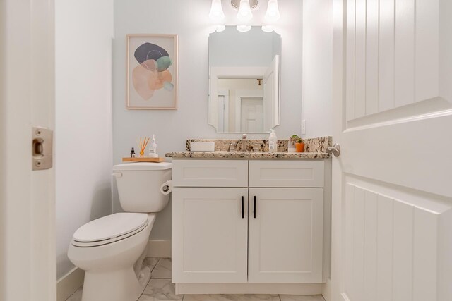 409 Hideaway Ln, Niceville, FL 32578 - half bath featuring marble look tiles and vanity