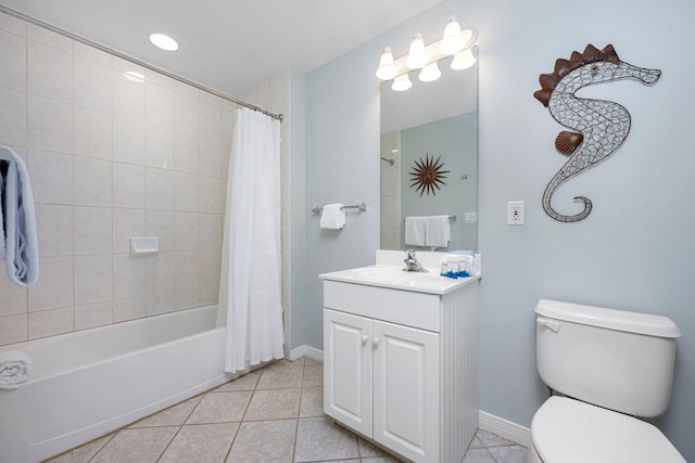 1515 SE Miracle Strip Pkwy Unit 613, Fort Walton Beach, FL 32548 - full bathroom with vanity, toilet, tile patterned floors, shower / tub combo with curtain, and baseboards